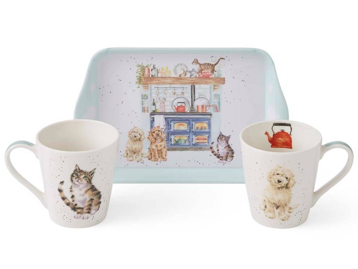A tea-time set featuring two speckled white ceramic mugs with watercolor illustrations of cats and a dog, alongside a matching rectangular tray with a light blue border and a watercolor kitchen scene with cats.