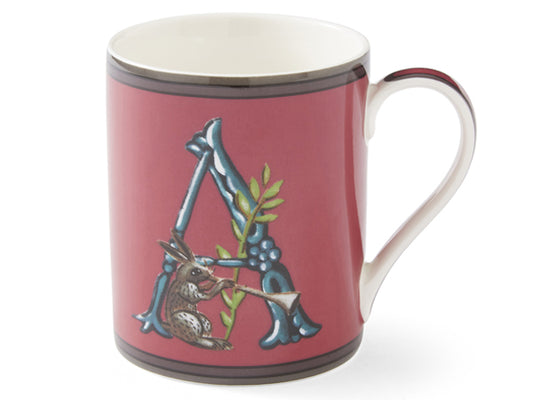  the mug showcases the letter 'A' in a graceful font, accompanied by a whimsical hare playing the trumpet at its base, surrounded by intertwining foliage.