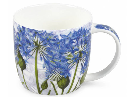 A white ceramic mug decorated with a detailed illustration of blue allium flowers and green seed pods, shown against a plain white background.