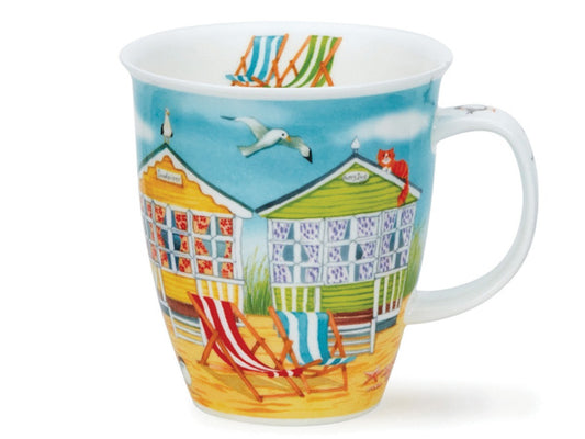  Exclusively designed by Kate Mawdsley, the mug showcases a series of four beach huts in blue, red, yellow, and green, set against a blue sky with seagulls overhead.