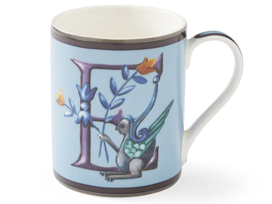 Featuring the letter 'E' adorned with an enchanting illustration of a mythical creature cradling vibrant orange blooms, this mug is a true work of art. Reflecting Spode's signature style, the meticulously crafted blue handle adds an extra touch of elegance to this piece. 