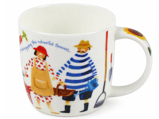 A white ceramic mug featuring a colorful illustration of a gardener and a strawberry planter, with the text 'enjoying the colourful flowers.