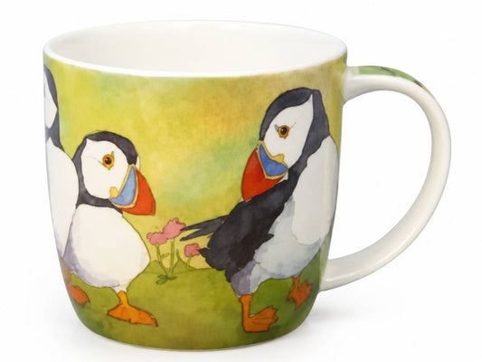 A white ceramic mug featuring a watercolor illustration of puffins on a yellow-green background, with a white handle and interior.