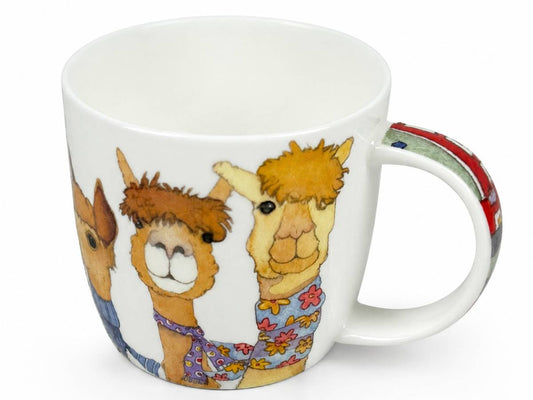 A white ceramic coffee mug featuring a colorful illustration of three cartoon alpacas on the side, with a patterned handle.