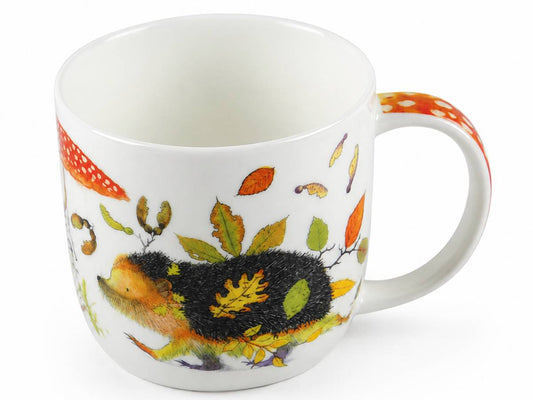 Emma Ball hedgehog mug with illustration of a hedgehog walking through leaves on a white fine bone china mug