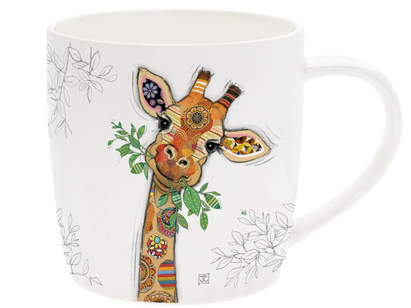 giraffe on a white mug ith some leaves in her mouth