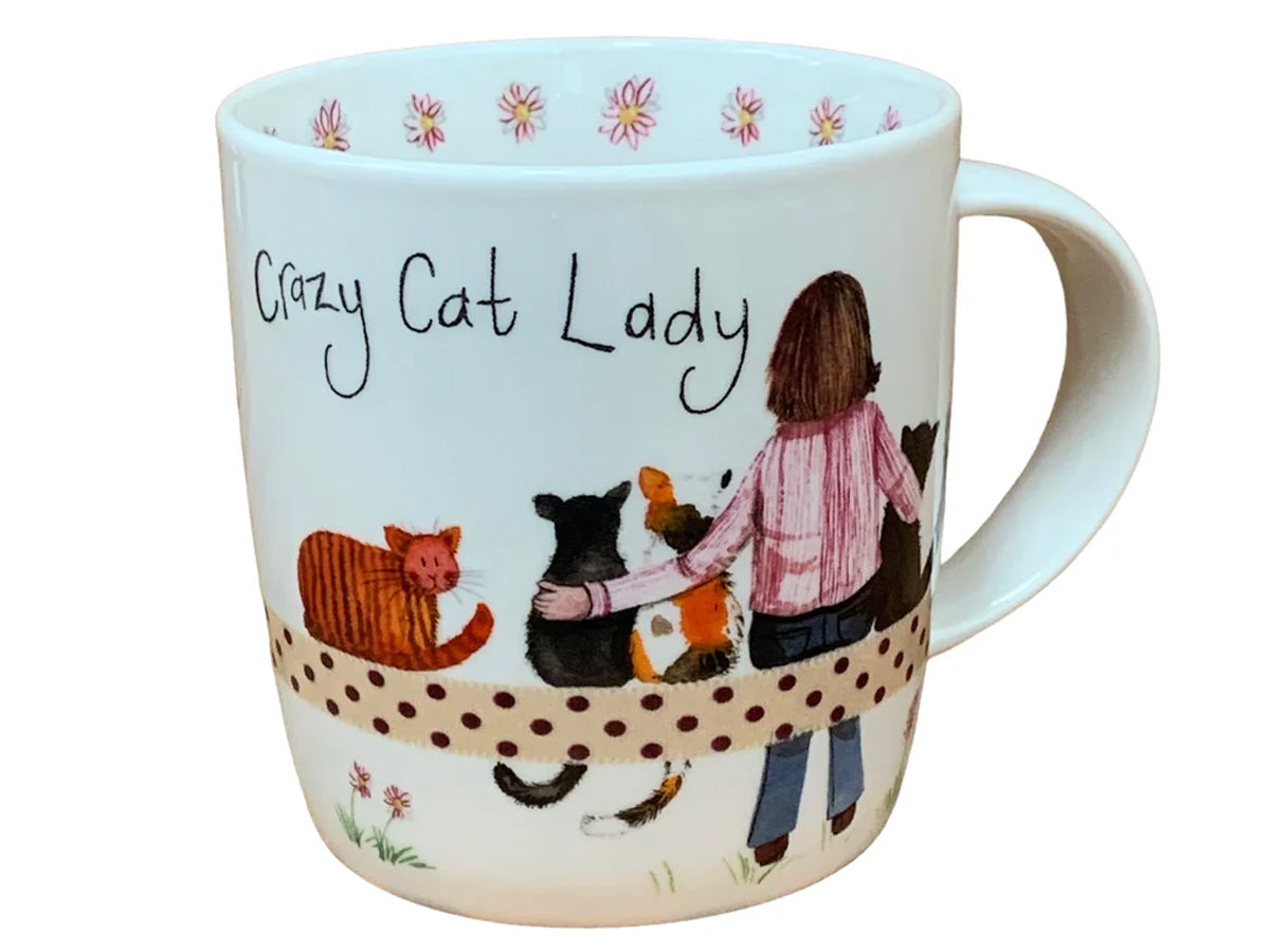 This Alex Clark mug features an illustration of a lady with her beloved cats, making it ideal for coffee, tea, and other hot drinks. Additionally, the mug boasts illustrations around the inside rim and down the handle, adding to its delightful appeal.