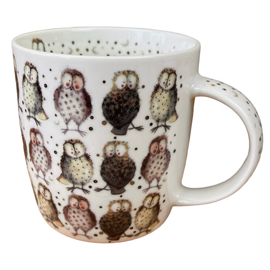 This Alex Clark mug is adorned with charming illustrations of adorable owls, making it perfect for enjoying coffee, tea, and other hot drinks. Additionally, the mug features illustrations around the inside rim and down the handle, adding to its whimsical appeal.