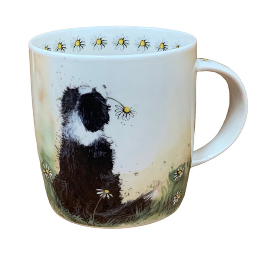 This Alex Clark mug features a beautiful collie dog admiring the view while holding a flower in its mouth. Additionally, the mug includes flower illustrations around the inside rim and down the handle, adding to its charming appeal