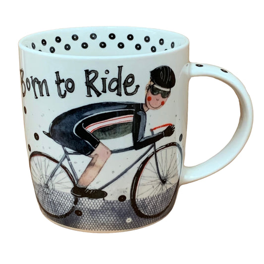 The Alex Clark mug features an illustration of a bike rider on a racer cycle bike with the words "born to ride" on the top. Adding to its design, the mug includes a black dot illustration around the inside rim and down the handle