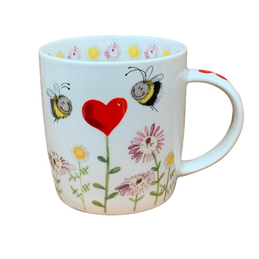 The Alex Clark mug depicts two lovely bees hovering over a heart flower. Complementing its design, the mug includes flower illustrations around the inside rim and down the handle.