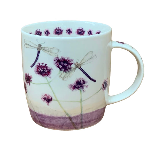 The Alex Clark mug features charming dragonflies hovering over meadow flowers in its illustration. Adding to its appeal, the mug includes a flower illustration around the inside rim and illustrations down the handle.