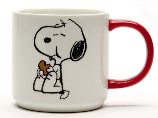 This gorgeous Magpie snoopy mug shows Snoopy from the Peanuts comic strip, having a wonderful time eating his cookie, it comes with a red handle. On the reverse side of the mug, you'll find a humorous declaration, 'I'm one cookie away from being happy.