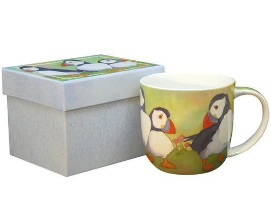 The "Puffins" Bone China Mug, designed by Emma Ball, comes beautifully packaged in a luxurious gift box, making it perfect for gifting or enjoying as a delightful personal treat.