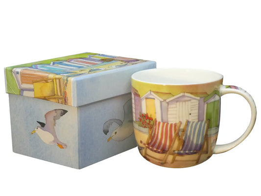 The "Beach Hut" Bone China Mug, designed by Emma Ball, is gracefully complemented by a charming presentation box, making it a superb option for gifting or as a delightful personal indulgence.