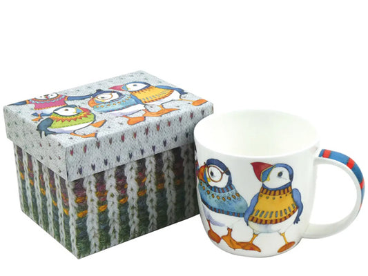 Crafted by Emma as part of her Woolly Puffin collection, these Fine Bone China mugs are elegantly presented in a captivating gift box, making them the ideal gift for a special someone.