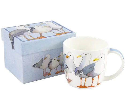 Crafted by Emma Ball, this Fine Bone China mug adorned with Seagulls is tastefully showcased in a captivating gift box, making it the ideal gift for a special someone.