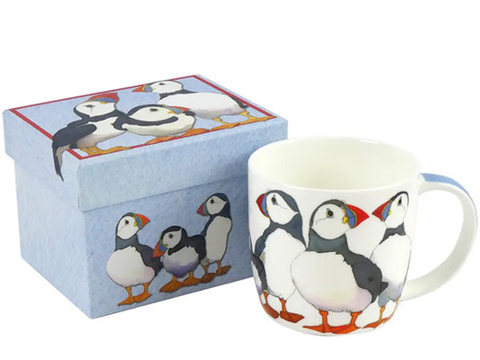 Designed by Emma Ball, this Fine Bone China mug featuring Puffins is elegantly presented in a captivating gift box, making it the ideal gift for a special someone.