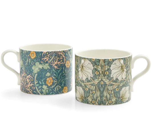 When it comes to mugs, Spode's Morris &amp; Co. collection consistently offers timeless style, sophistication, and elegance. Indulge in the pleasure of your morning coffee with this striking pair of complementary mugs, showcasing the iconic Pimpernel and Seaweed designs in gracefully soft hues. Presented tastefully in a custom Morris &amp; Co. box, these mugs are both a delight to behold and a joy to use.