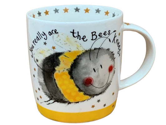 This Alex Clark mug features a delightful illustration of a joyful bee alongside the words "you really are the bees knees." It's perfect for enjoying coffee, tea, and other hot drinks. Additionally, the mug includes illustrations around the inside rim and down the handle, enhancing its charm and appeal.
