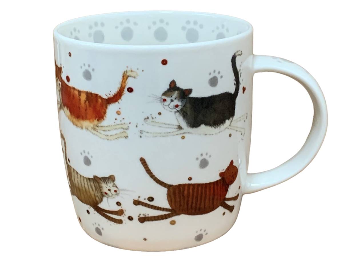 This Alex Clark mug showcases an array of cheerful cats in its illustration, making it an ideal choice for coffee, tea, and other hot beverages. Additionally, the mug boasts illustrations around the inside rim and down the handle, adding to its charm and appeal.