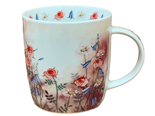 The Alex Clark mug features an illustration of a meadow full of wild flowers. Additionally, the mug includes meadow flower illustrations around the inside rim and down the handle, adding to its charming appeal.