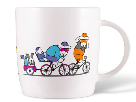Cycling Herdy & Sheppy Mug in fine bone china showing Herdy and Sheppy cycling together through the countryside—ideal for cycling enthusiasts and Herdy collectors.