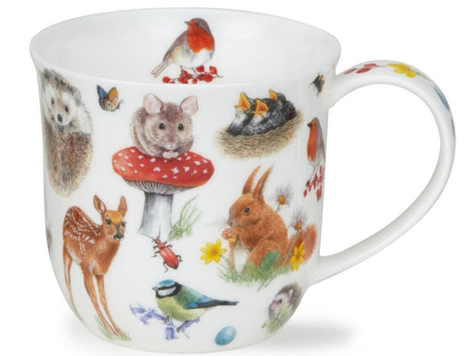 A white ceramic mug decorated with a colorful woodland animal pattern featuring a red-breasted bird, hedgehog, mouse on a red mushroom, birds in a nest, rabbit, deer, beetle, and bluebird.