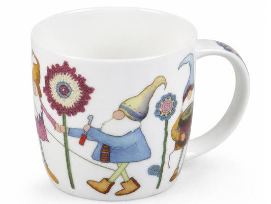 A white ceramic mug featuring whimsical painted garden gnome characters and colorful flowers on a clean white background.