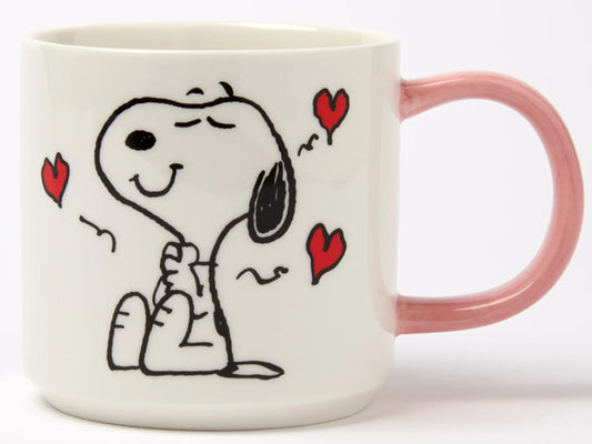 Magpie x Peanuts Snoopy I Love You mug with pink handle, featuring Snoopy surrounded by red hearts on a white vegan fine china mug