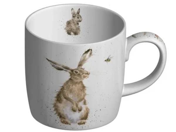 A white ceramic mug featuring a watercolor-style illustration of a brown hare and a small bee, with a smaller hare printed inside the mug.