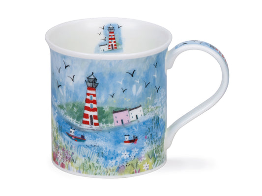 This quaint Seaside Cove mug depicts the view when a boat comes back into harbour, guided by a lighthouse.