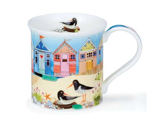 This charming Shore Life mug is full of colour and charm. Made of fine bone china, this Dunnon mug is embellished with a vibrant beach hut design, capturing the fun, quirky atmosphere of the British seaside.