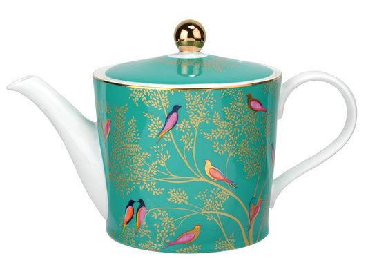 This striking Teapot belongs to the Sara Miller London Chelsea collection, crafted from white porcelain. Its vibrant green design, adorned with gold foliage and brightly colored birds, promises to captivate as a stunning centerpiece during your afternoon teas. Complete the ensemble by pairing it with matching tea cups and saucers, along with the Cream Jug and Sugar Pot, for a cohesive set